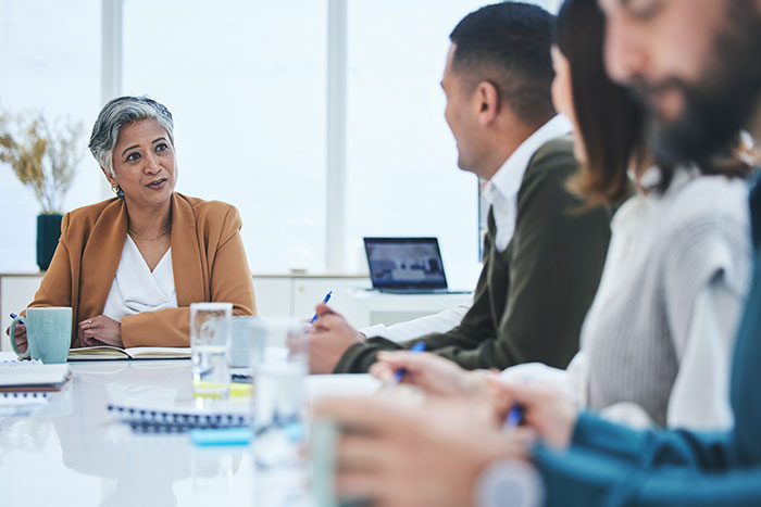 Image of people in a business meeting.