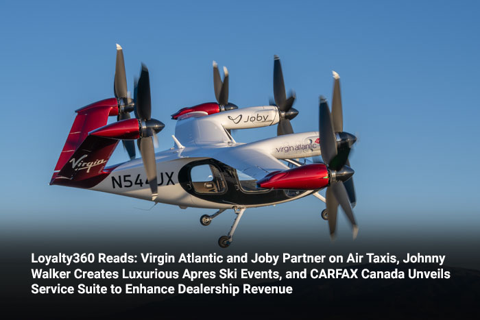 An advanced aircraft with propellers in flight against a blue sky, featuring Virgin and Joby branding.