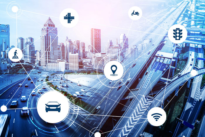 Cityscape with highways and network icons representing mobility and connectivity.