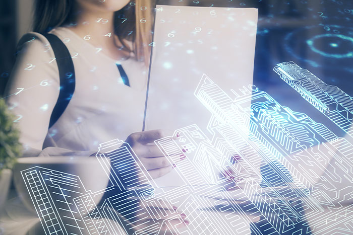 Businesswoman analyzing data on a tablet with abstract digital overlay of modern buildings, representing futuristic technology concepts.
